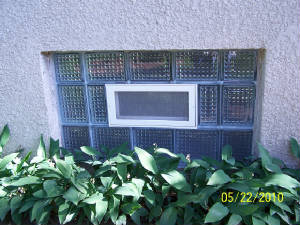 Holler Glass Block , Kevin Holler is a glass block basement window installation expert.  He has been updating old mortared windows with translucent silicone joints which are more durable.  Kevin Holler has been rated number one in the Twin Cities Glass Block repair field.JPG 4111 Washburn Ave N